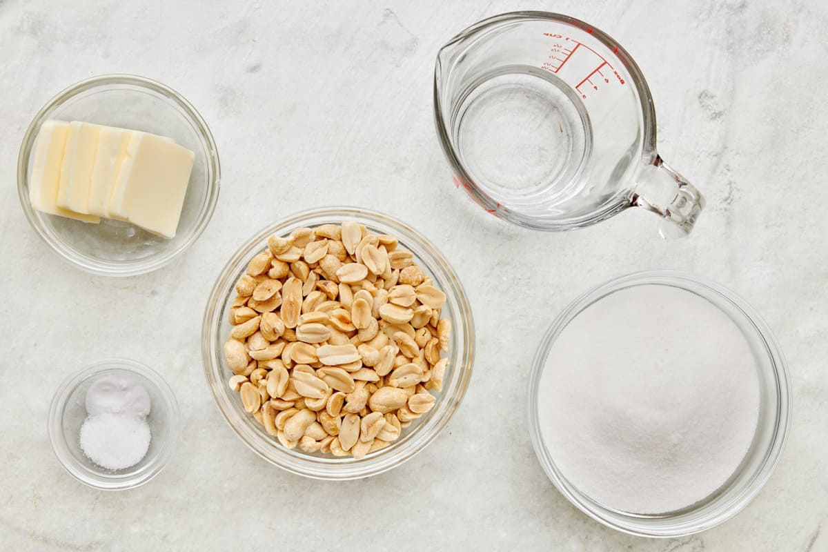 Ingredients for recipe: butter, salt, baking soda, peanuts, water, and sugar.