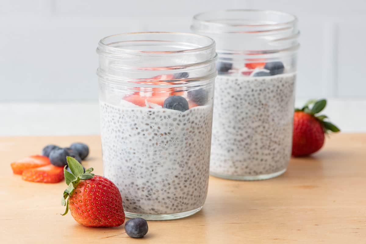 3 ingredient chia pudding show in an 8 ounce mason jar