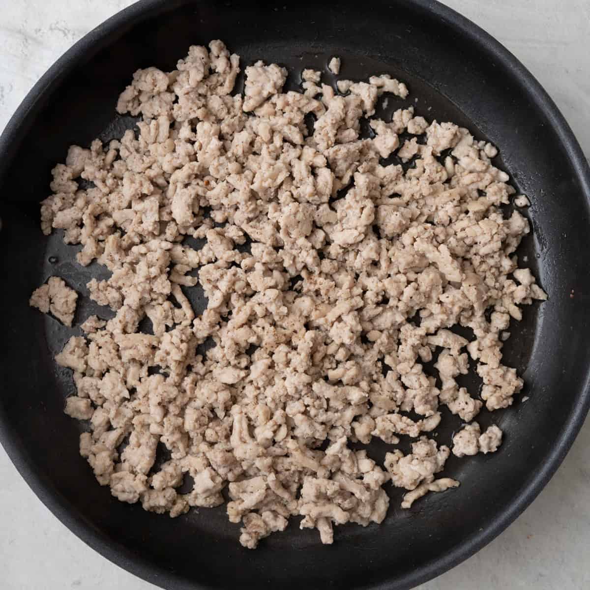 After browned and broken down into crumbles.