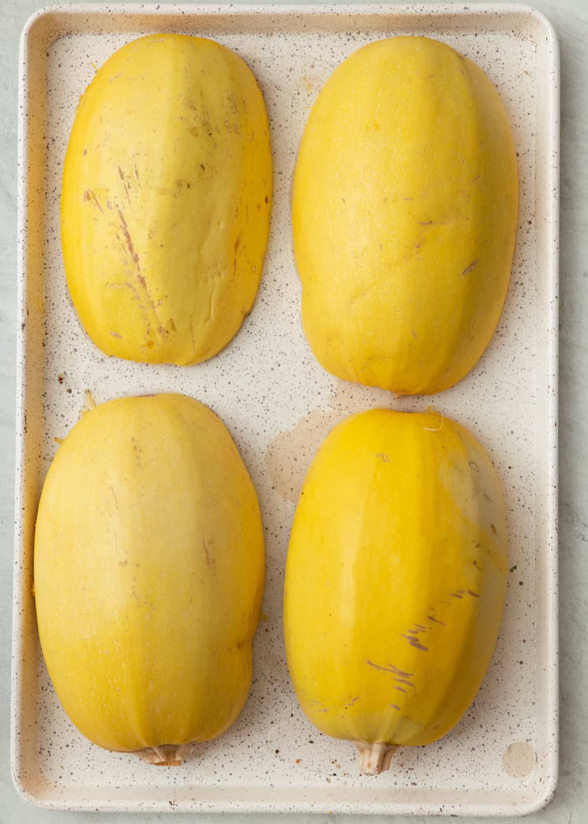 Squash upside down on baking sheet.