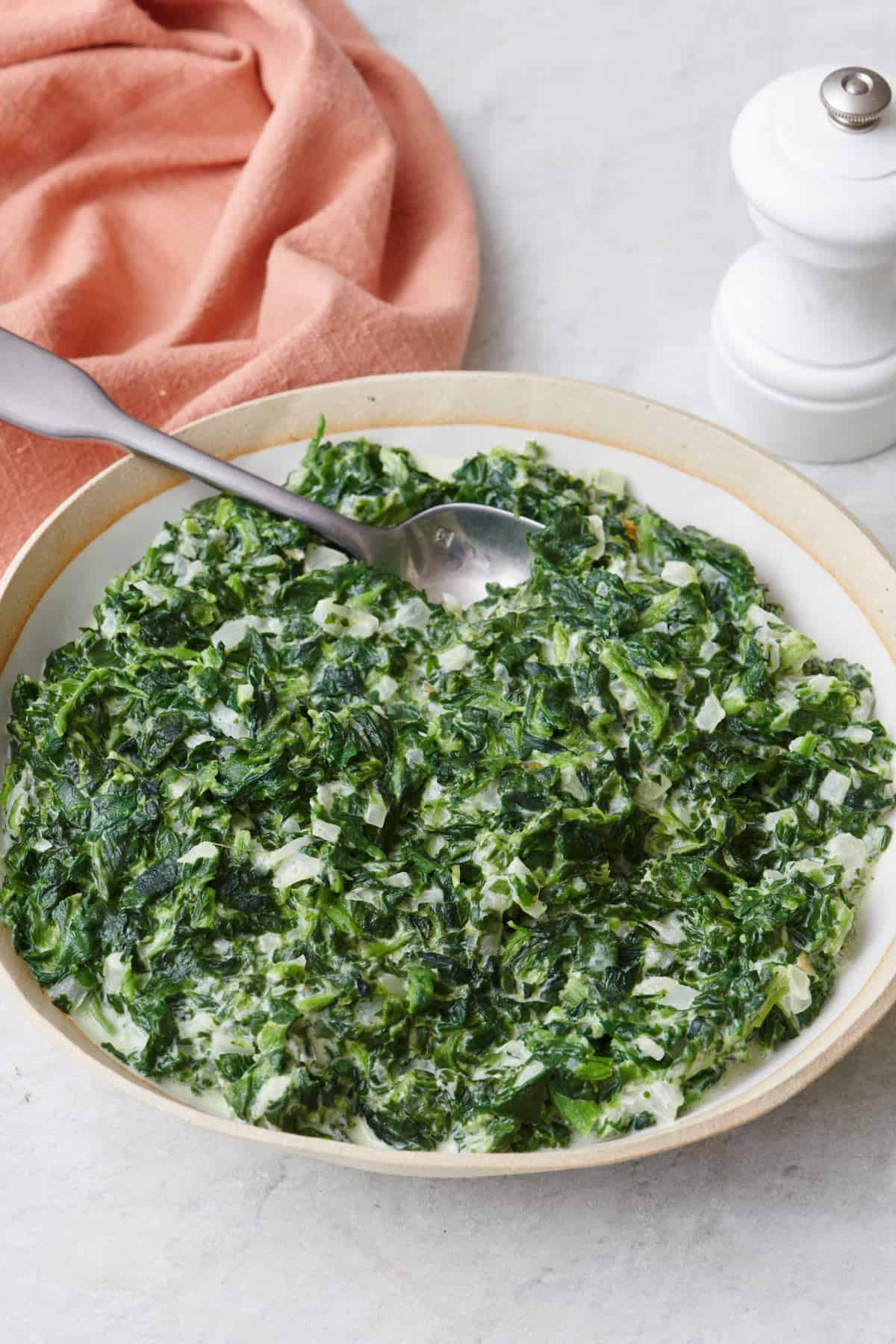Creamed spinach in bowl.