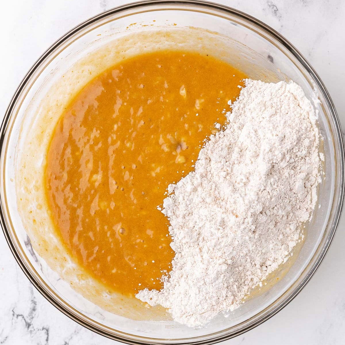 After combining with dry ingredients added before mixing.