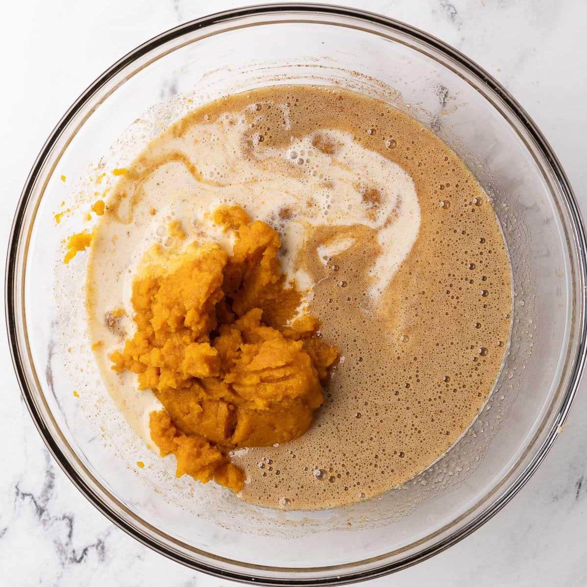 After spices are combined with pumpkin puree and evaporated milk added.