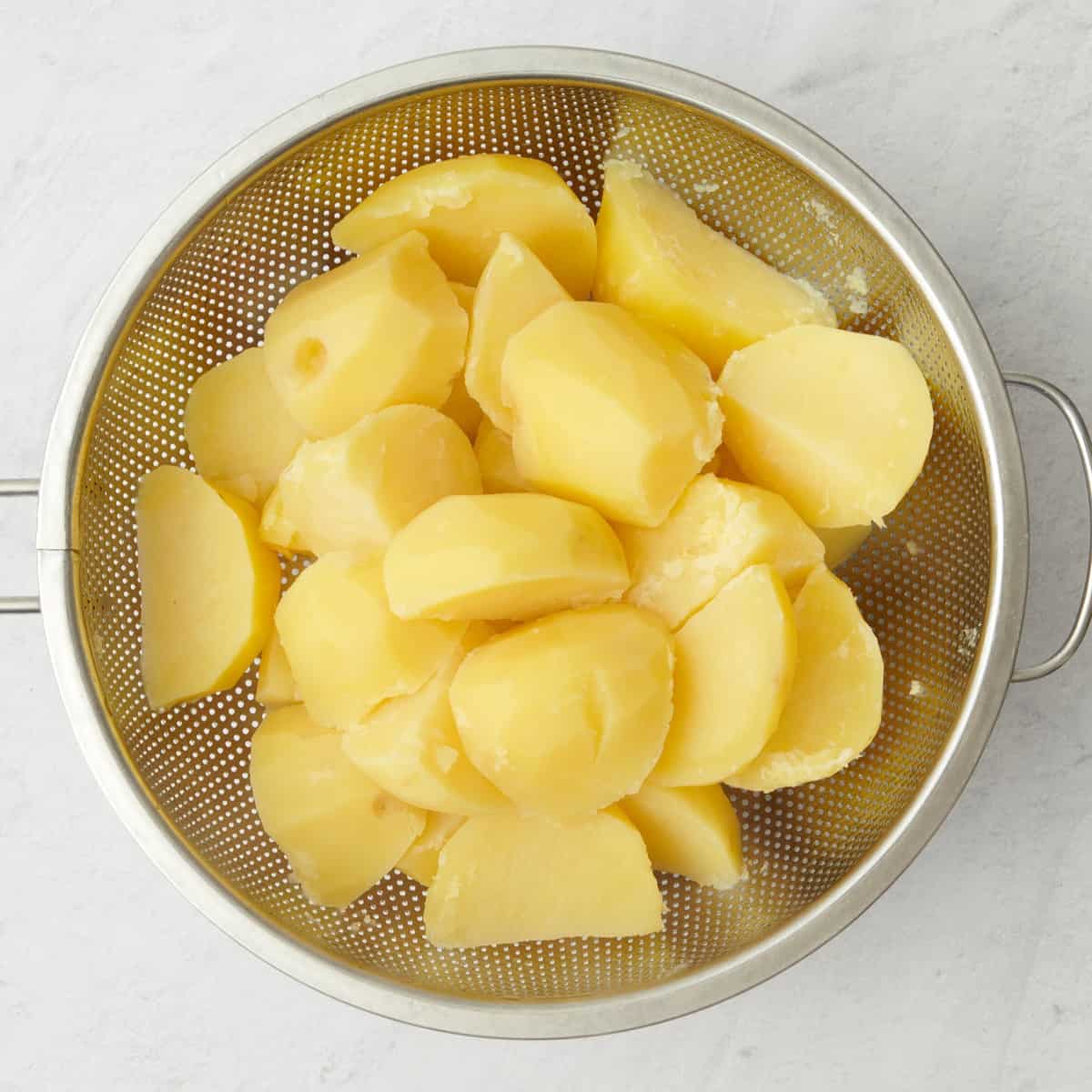 Potatoes in a colander.