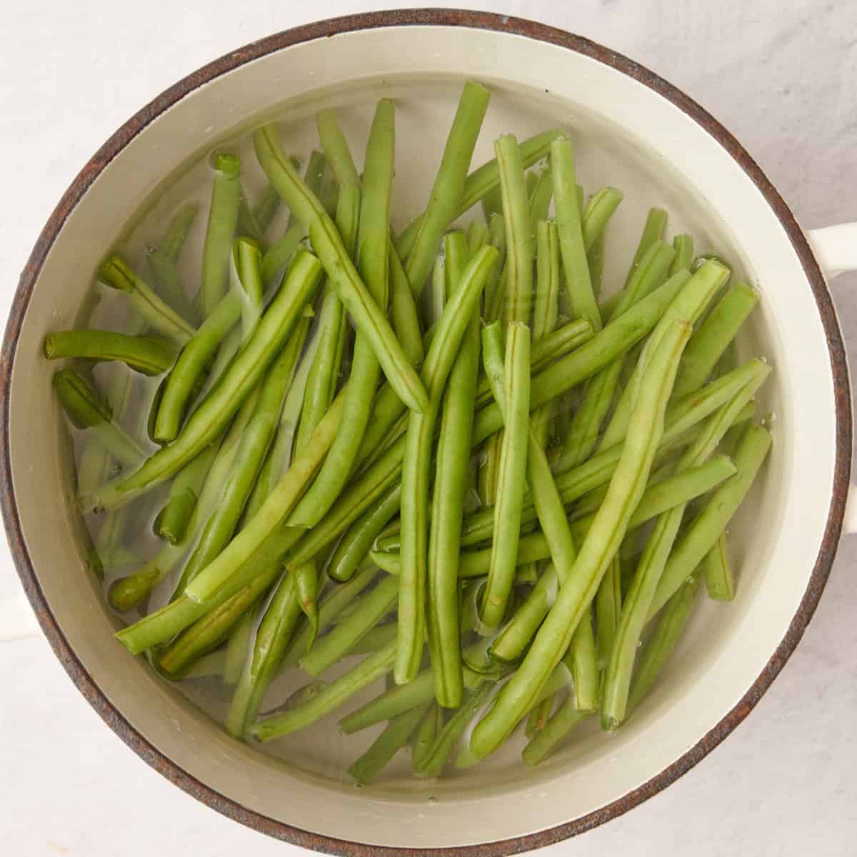 Green beans in boiling water.