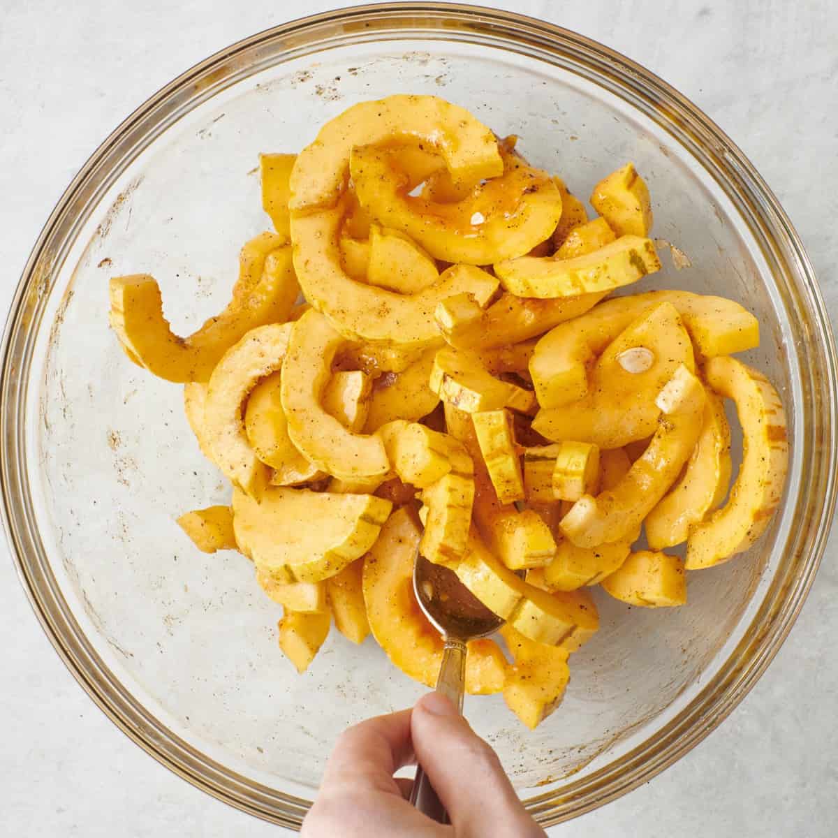 Tossing together to coat well.