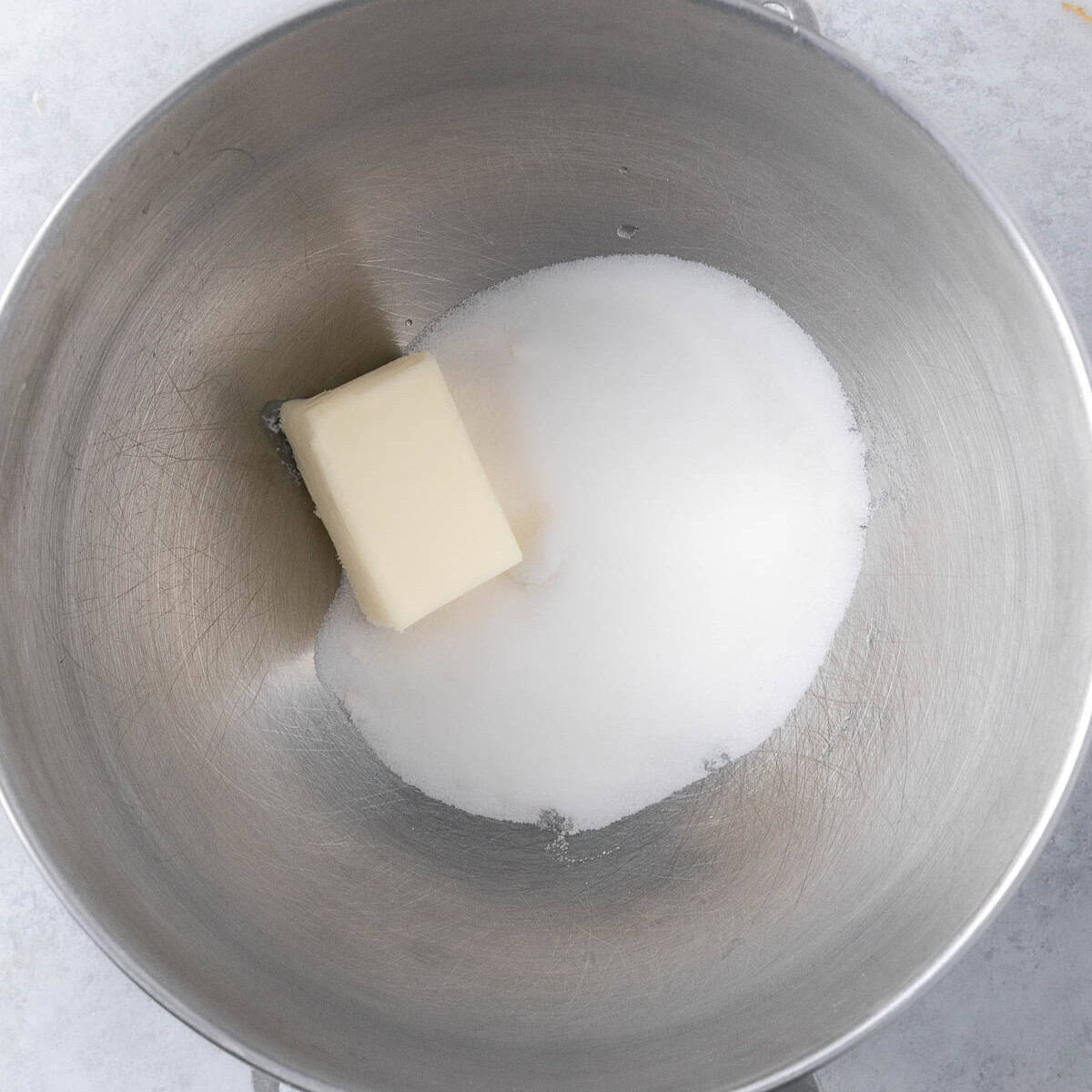 Butter and sugar in the bowl of a stand mixer before creaming.