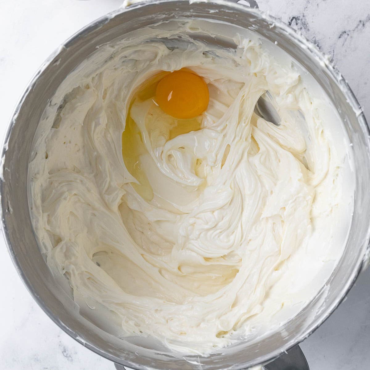 After combining with an egg added.