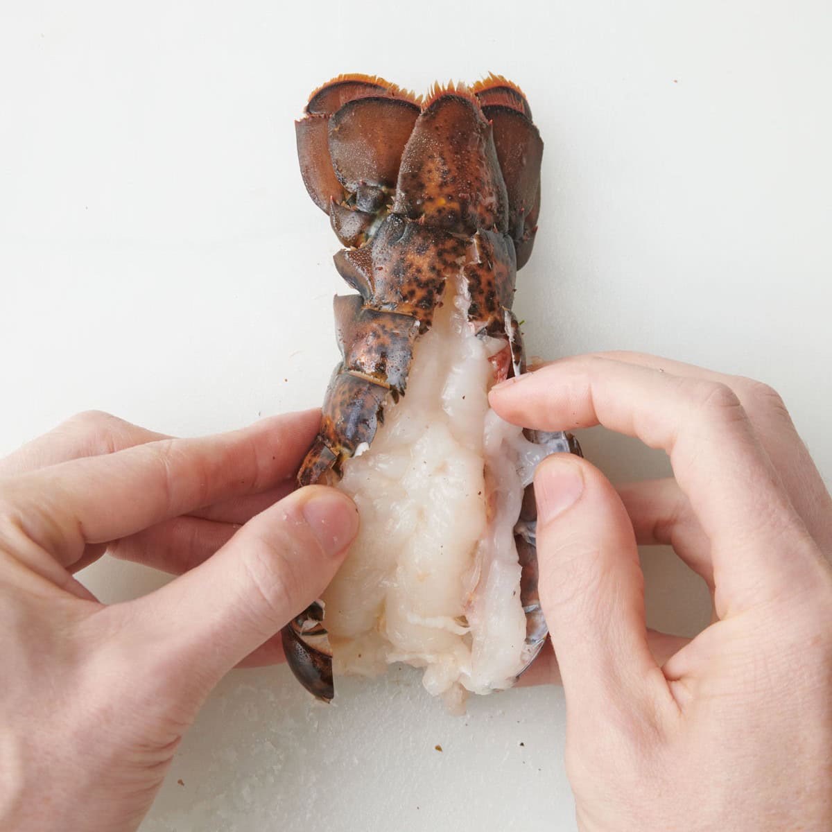 Finger loosening the meat.