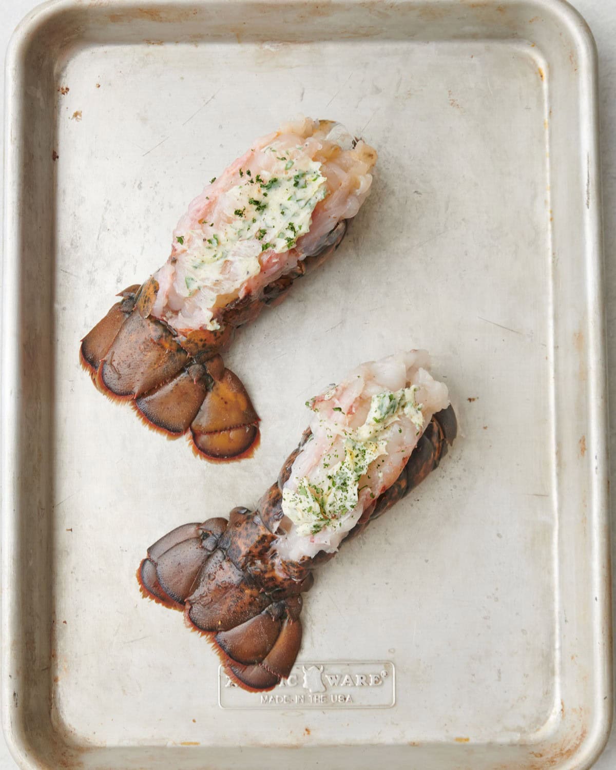 Prepared lobster tail before cooking.