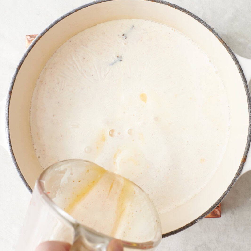 Egg mixture added to pot with remaining milk.