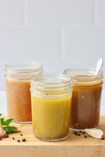 Three ways to make a vinaigrette dressing: with apple cider vinegar, with olive oil, and with balsamic vinegar.