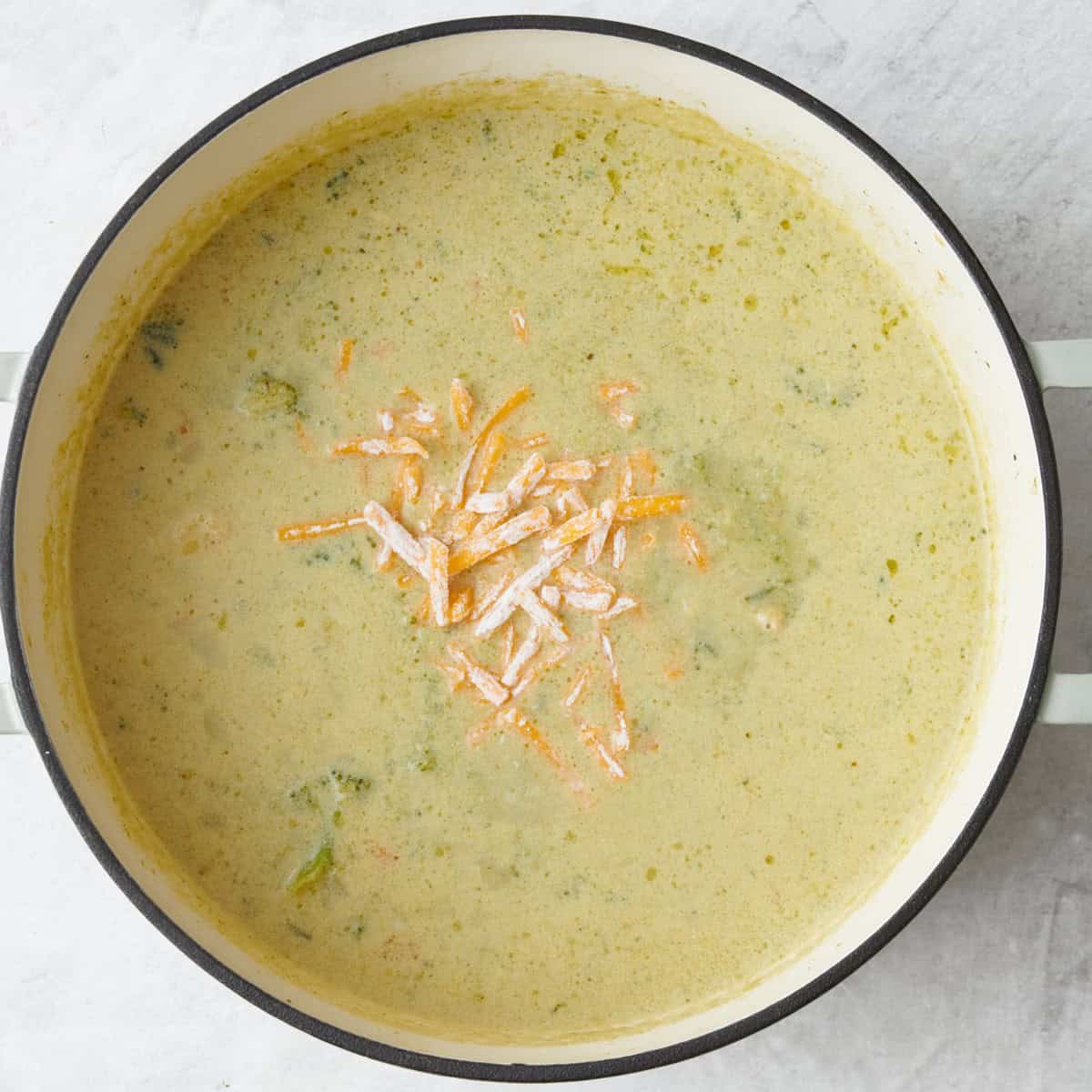 Flour-coated cheese added on top.