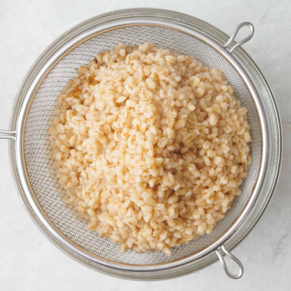 Barley in a strainer.