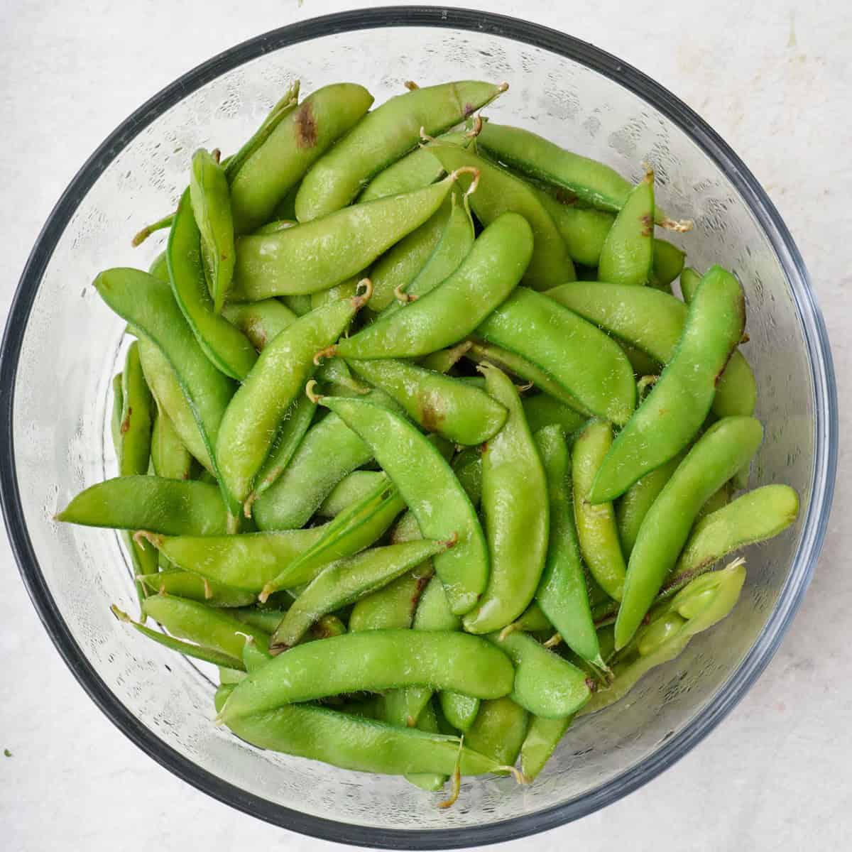 Edamame in a bowl after it is microwaved.