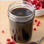 Jar of homemade pomegranate molasses.