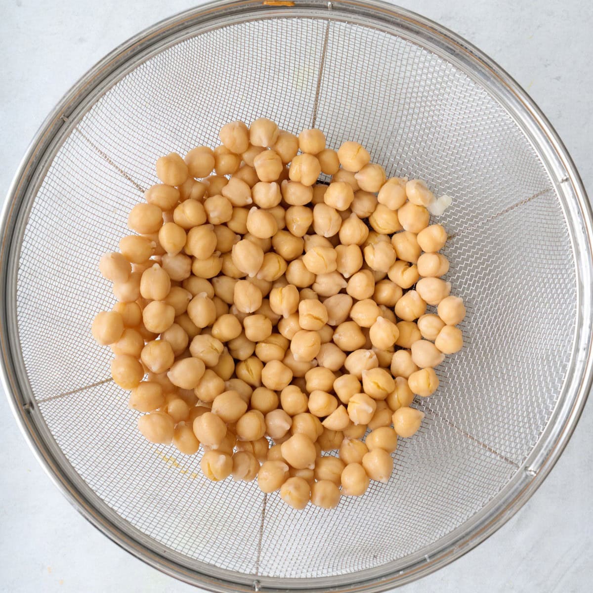 Chickpeas in a colander.