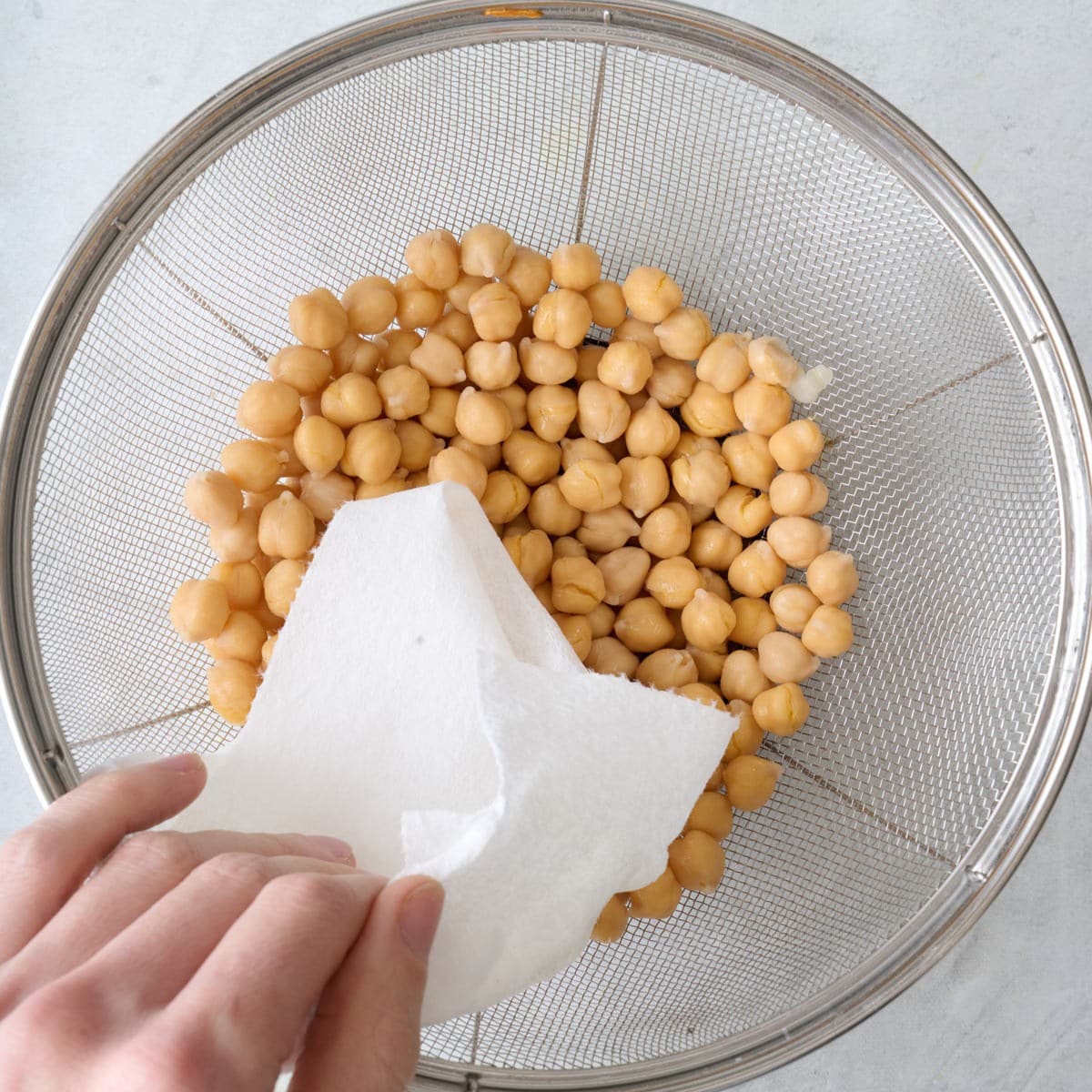 After rinsing and patting them dry with paper towels.