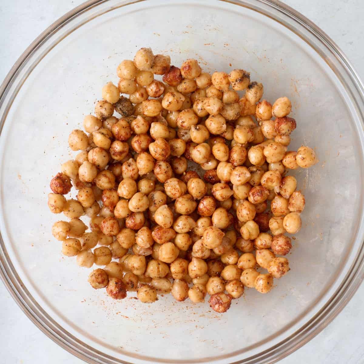 After tossing to fully coat in the bowl.