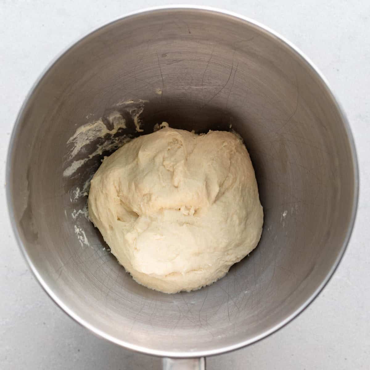 Dough in mixer after fully mixed.