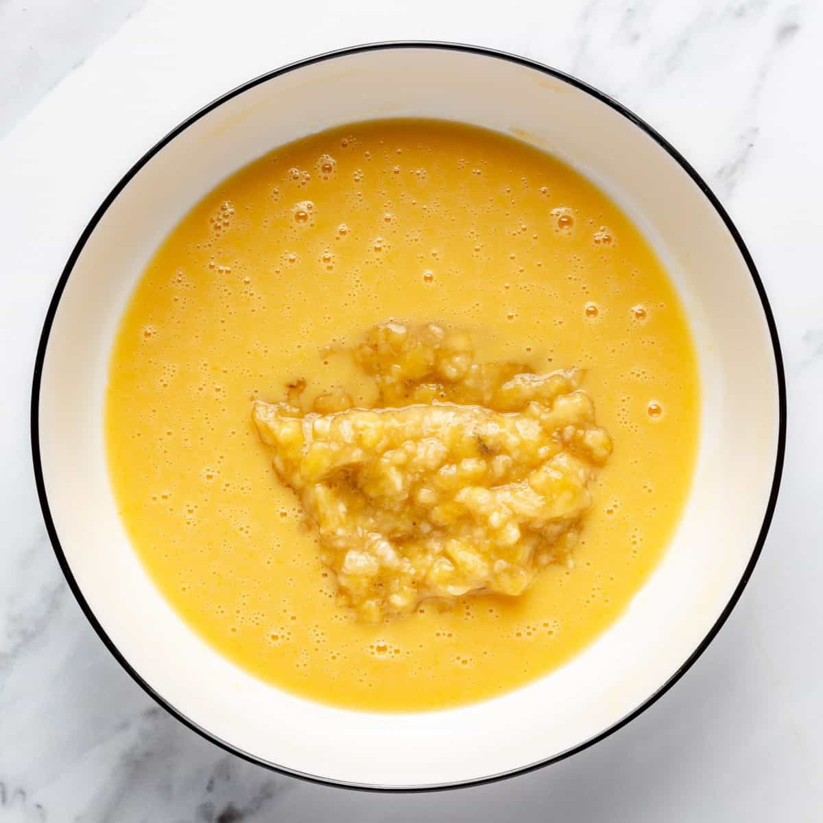 Mashed banana added to the bowl.