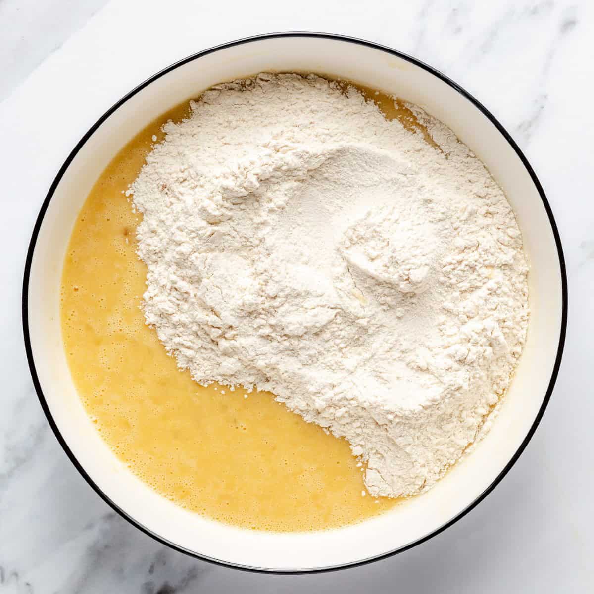 Dry ingredients added to the bowl of wet.