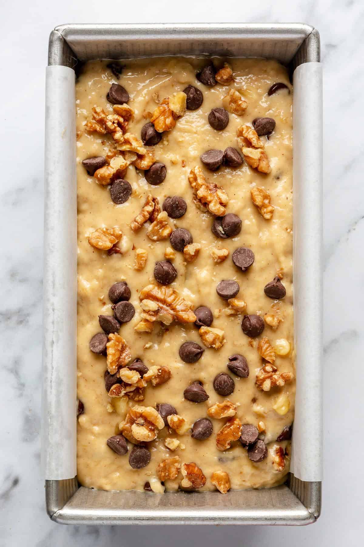 Batter in a loaf pan.
