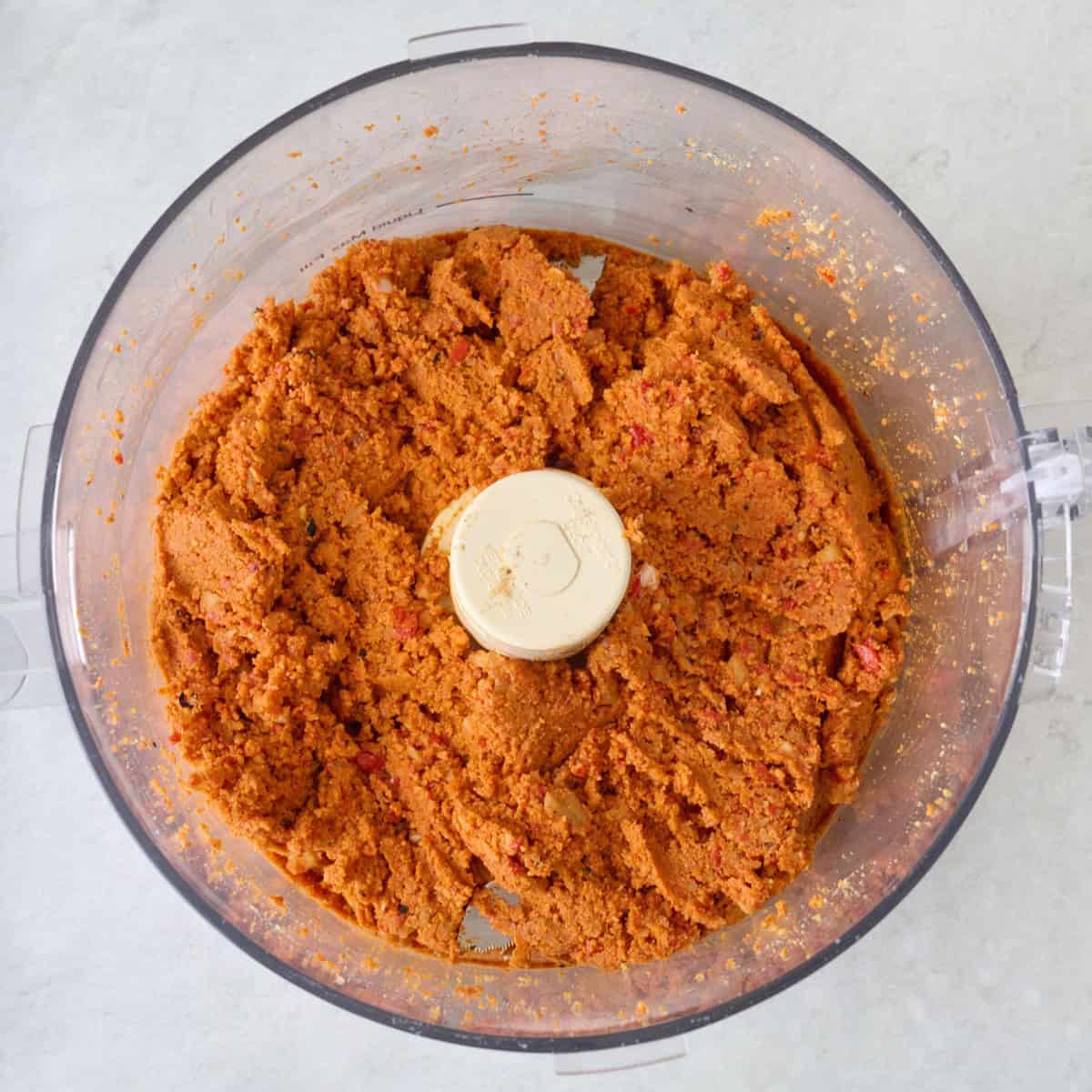 Ingredients to make muhammara in a blender after blending.