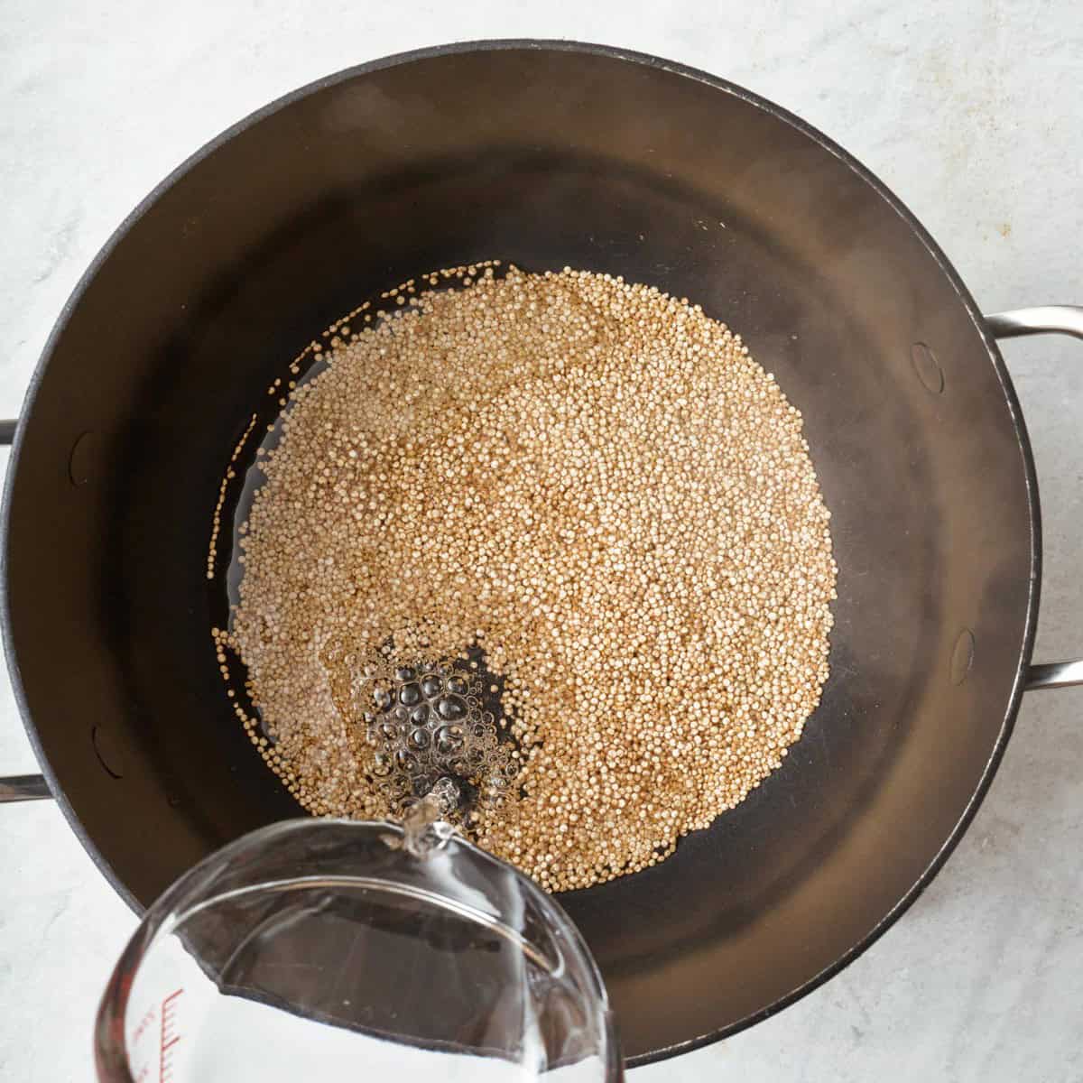 Quinoa in a pot of water.