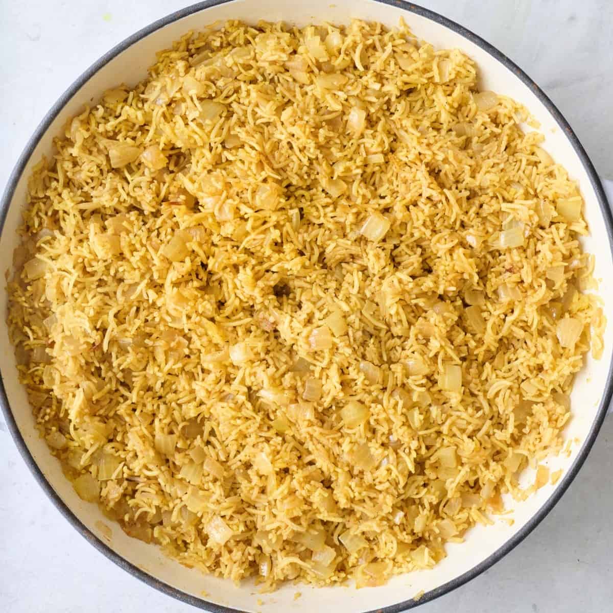 After water is absorbed and rice is fluffed.