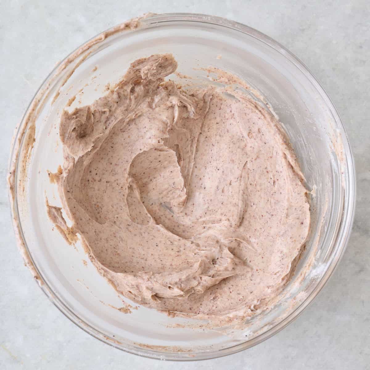 Whipped cinnamon butter in a small bowl.