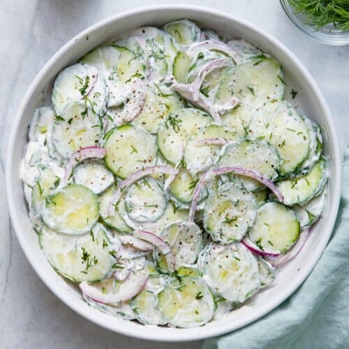 Creamy cucumber salad thumbnail image.