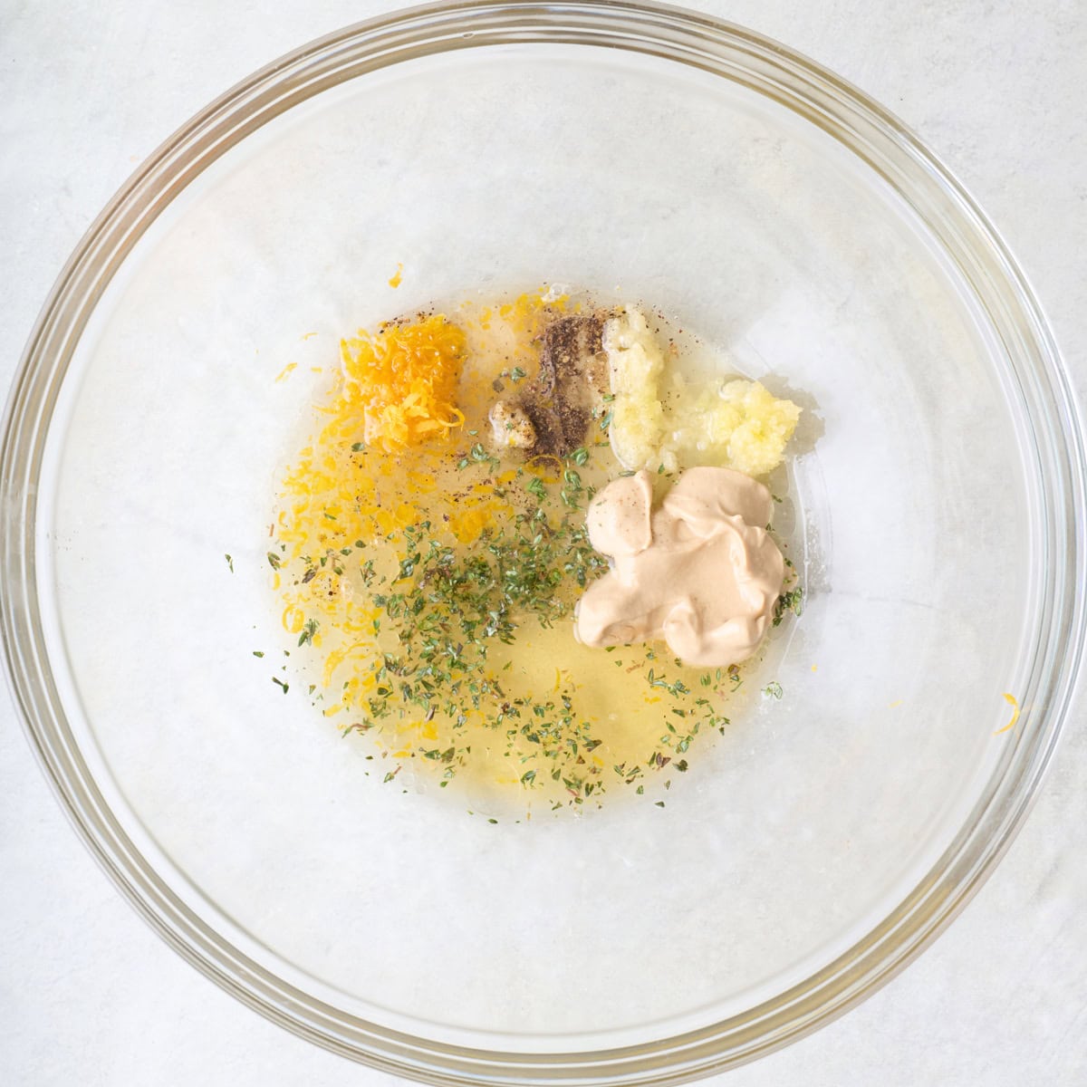 Marinade ingredients in a bowl before mixing.