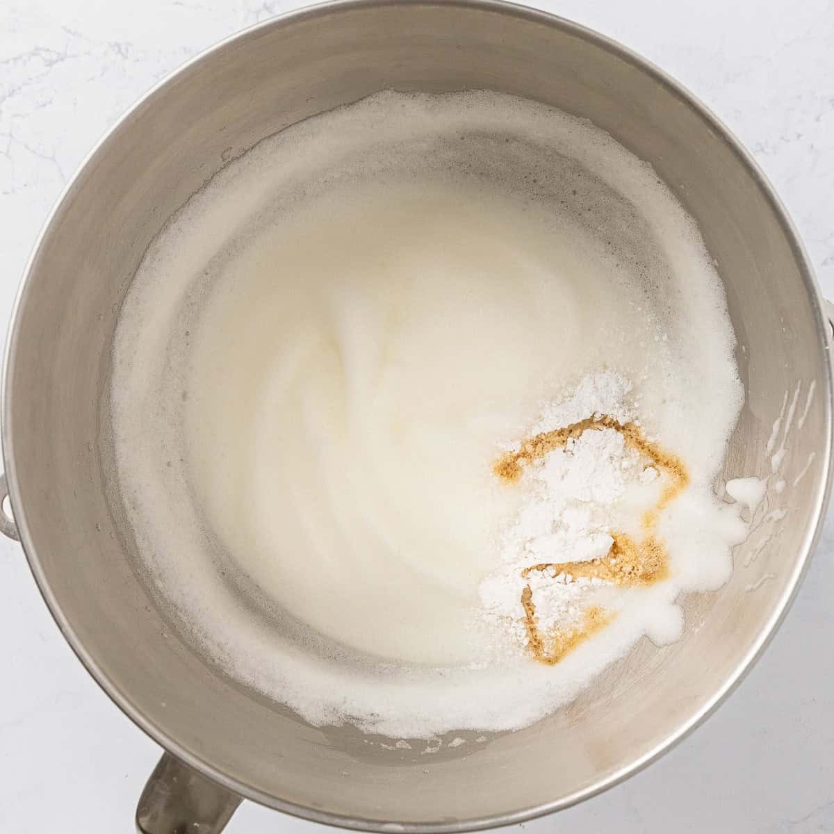Cream of tartar and vanilla added to the whipped eggs.