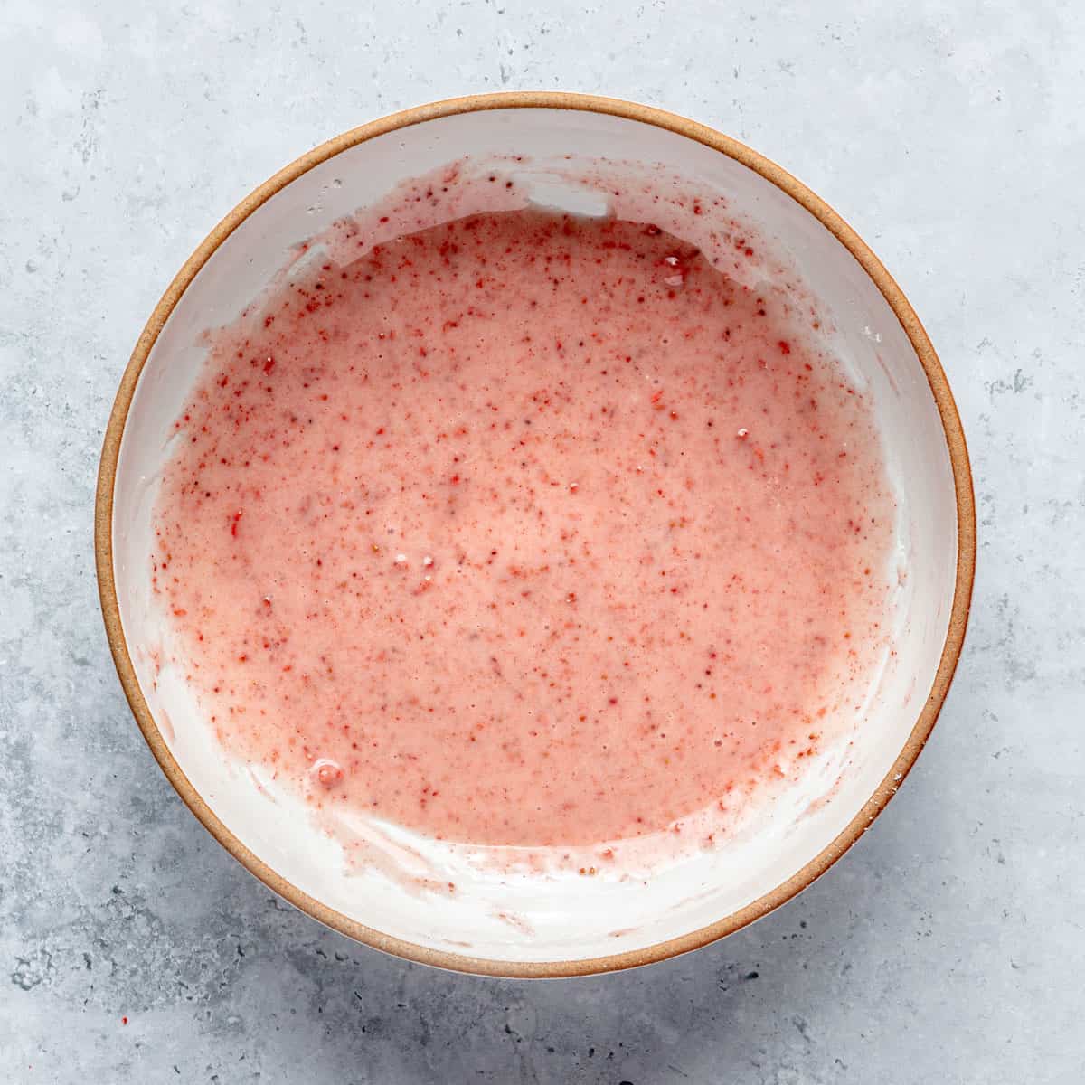 A strawberry glaze in a small bowl.