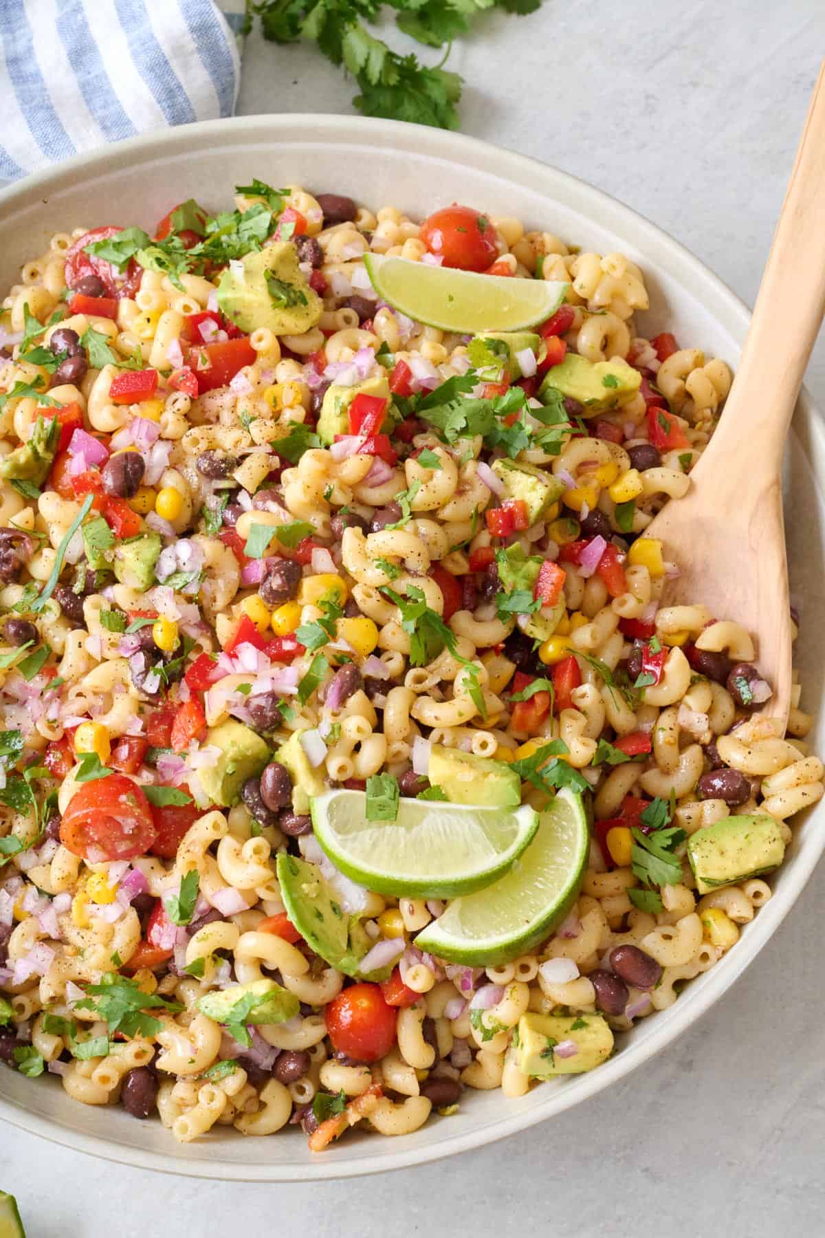 Taco pasta salad in a large white serving bowl.