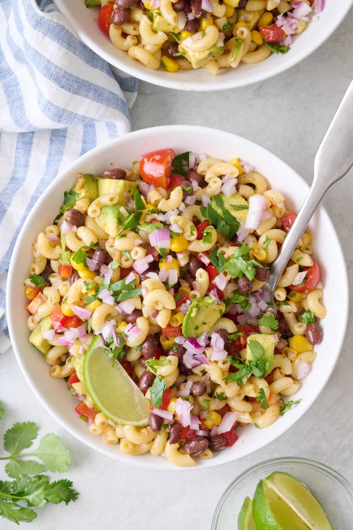 Two bowls of taco pasta salad.