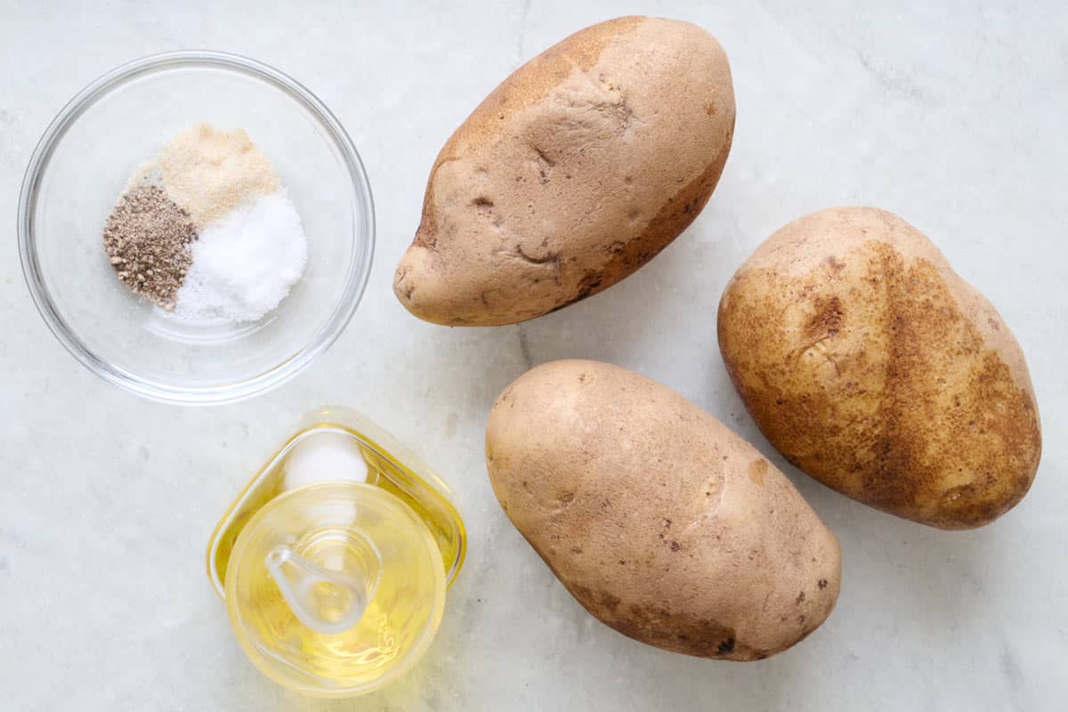 Whole potatoes, oil, and spices.