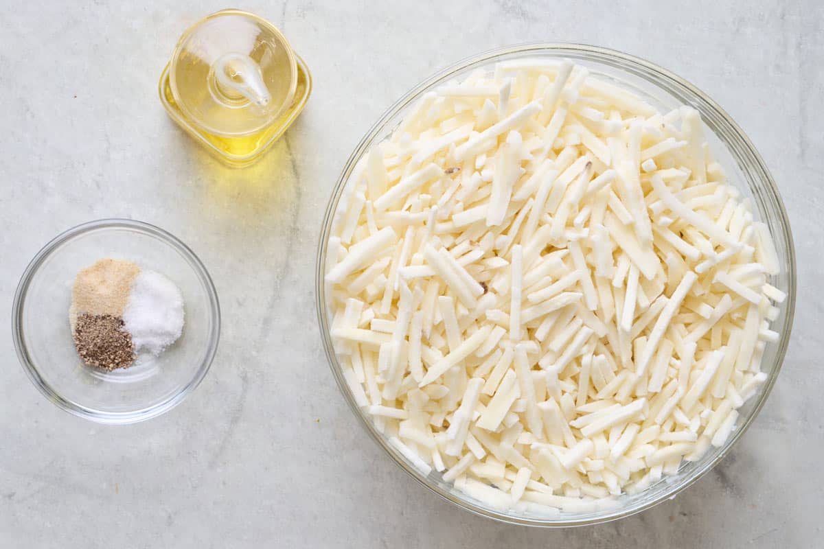 Frozen, shredded potatoes, oil, and spices.