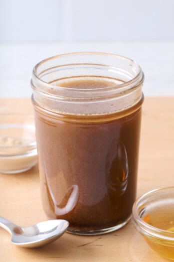 Easy homemade balsamic vinaigrette in a small mason jar.