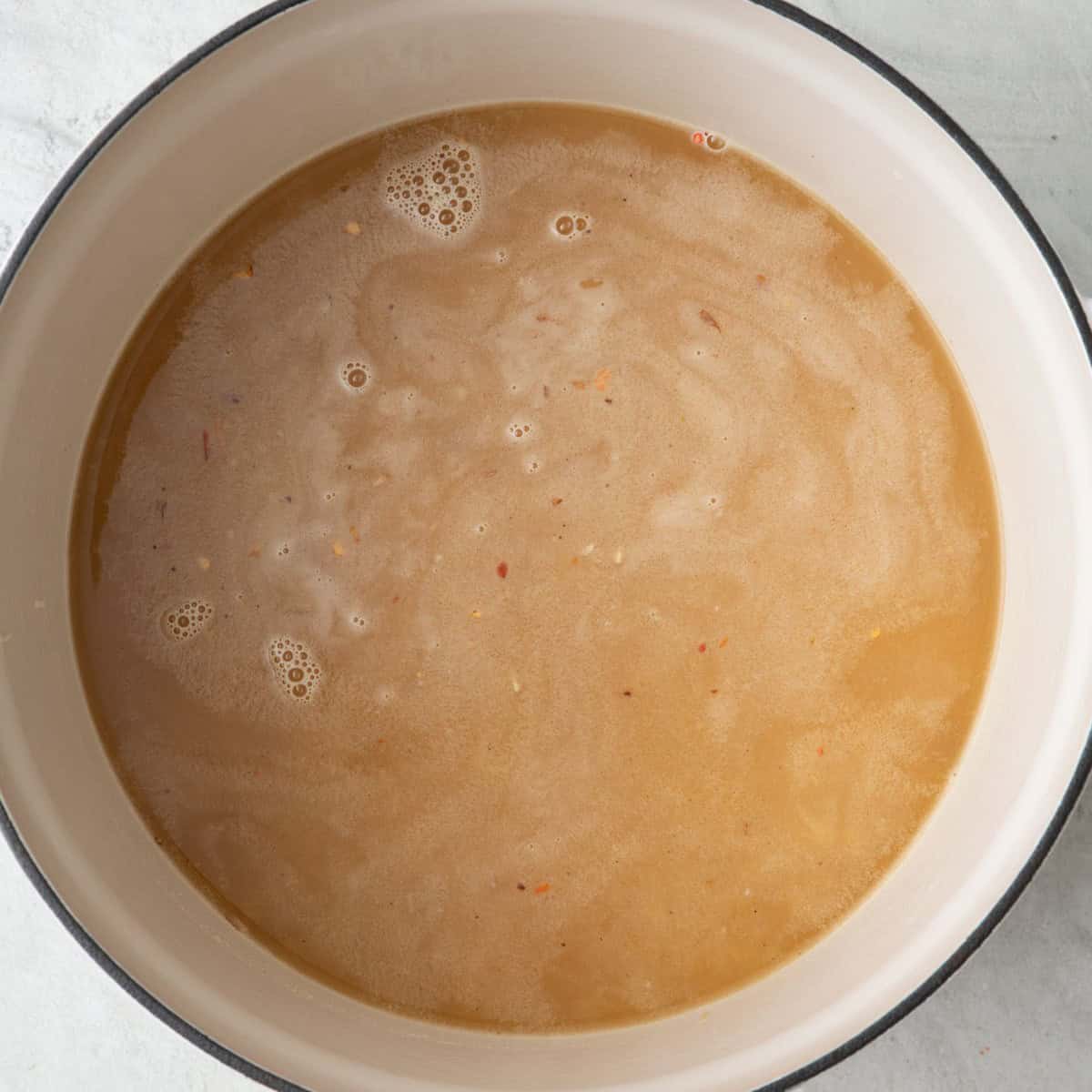 After toasting with salt, pepper, red pepper flakes, stock and lemon added.