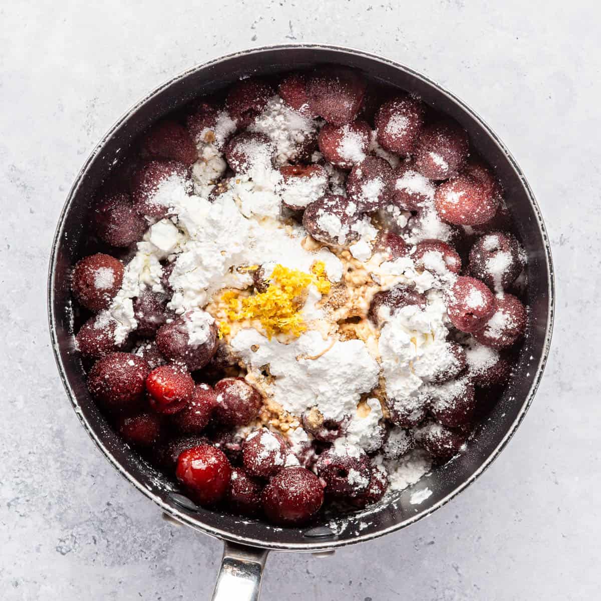 Cherry filling ingredients in a saucepan.