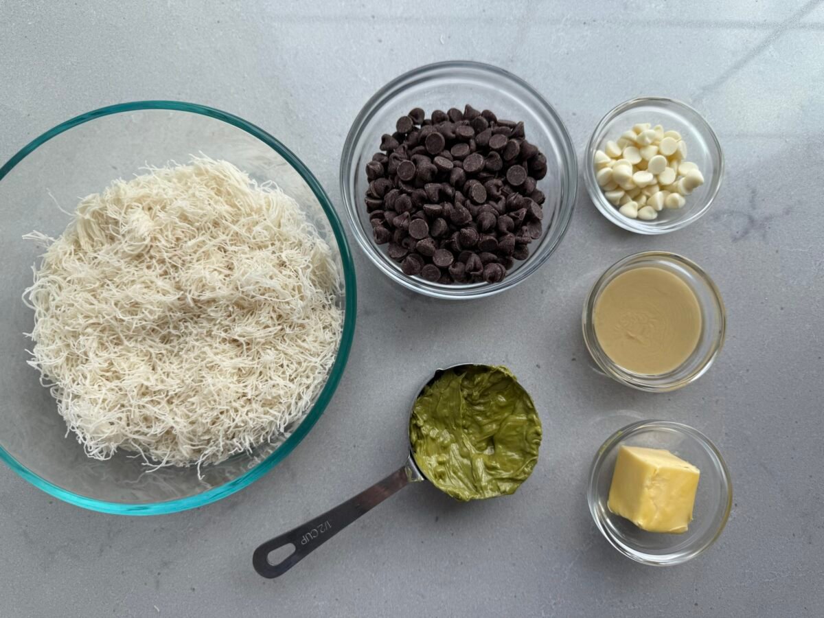 Ingredients to make the recipe: shredded phyllo dough, chocolate chips, pistachio butter, tahini, butter, and white chocolate chips