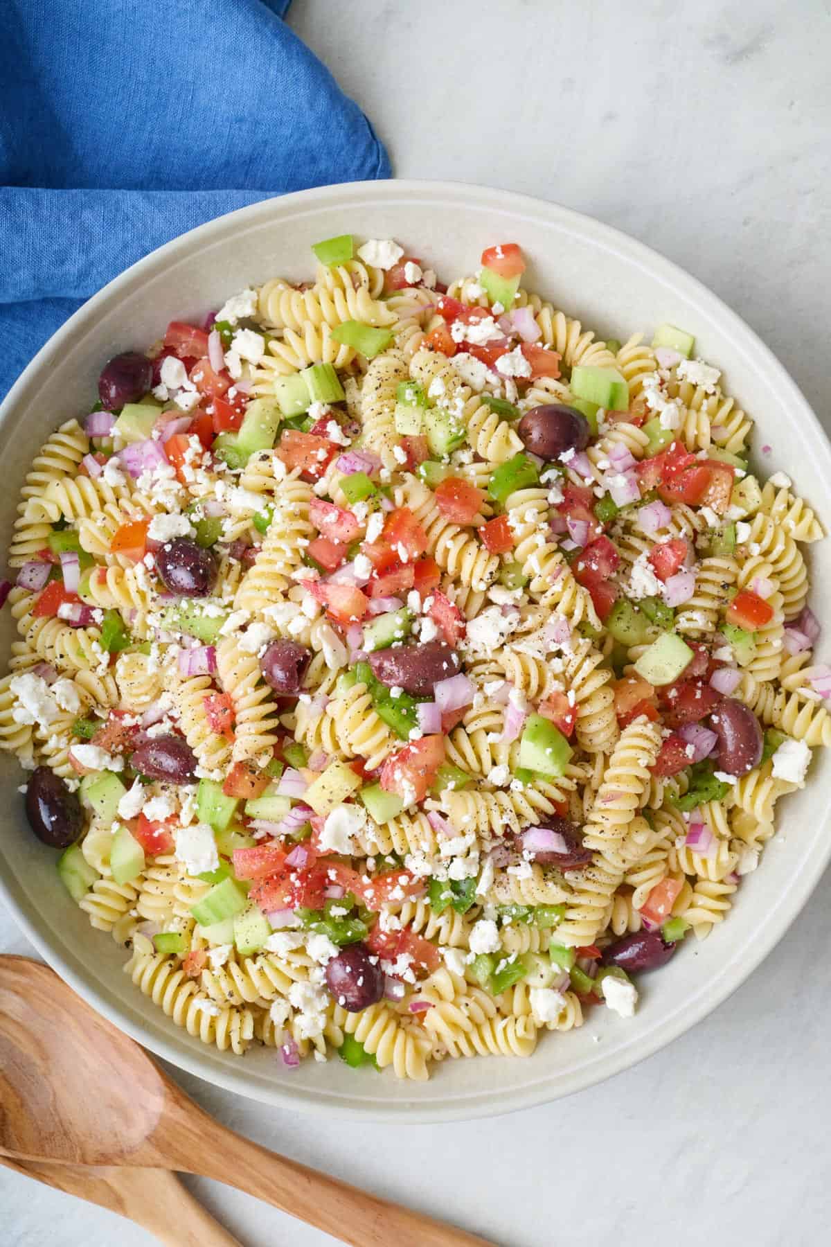 Greek pasta salad in a large serving bowl.