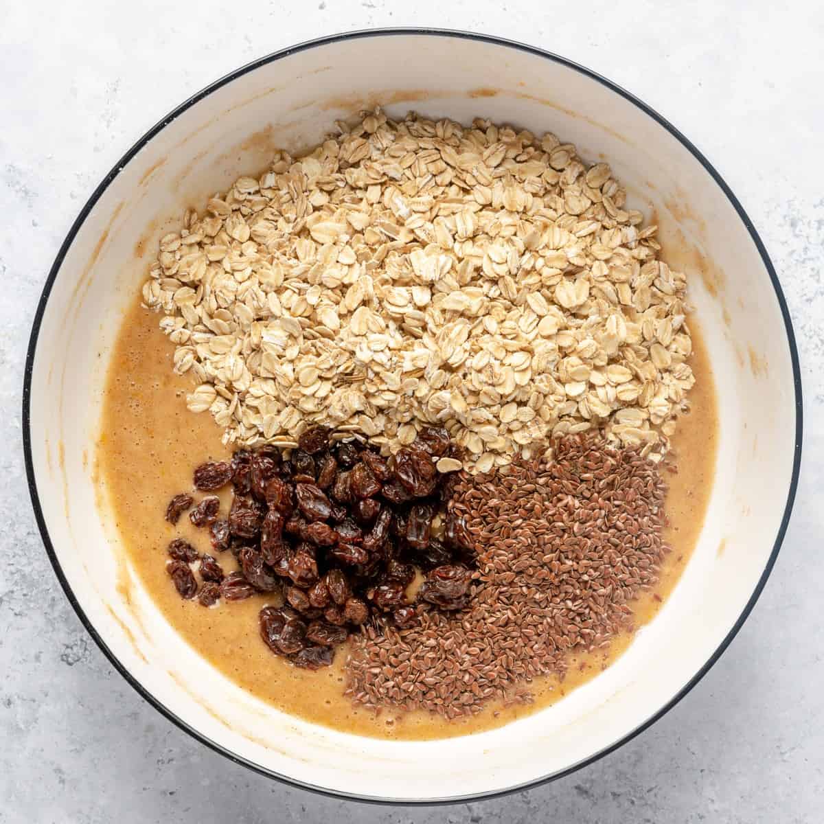 After wet and dry are combined with oats, raisins, and flaxseed added before mixing.