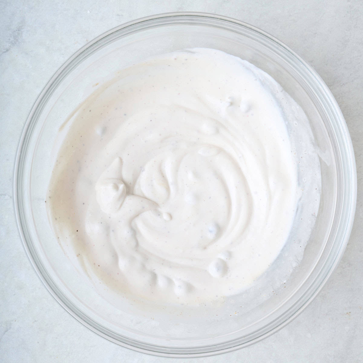 Creamy Greek yogurt dip in a bowl.