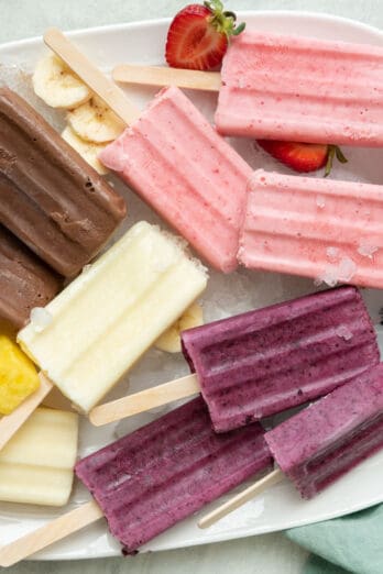 frozen yogurt popsciles on a tray with 4 flavors