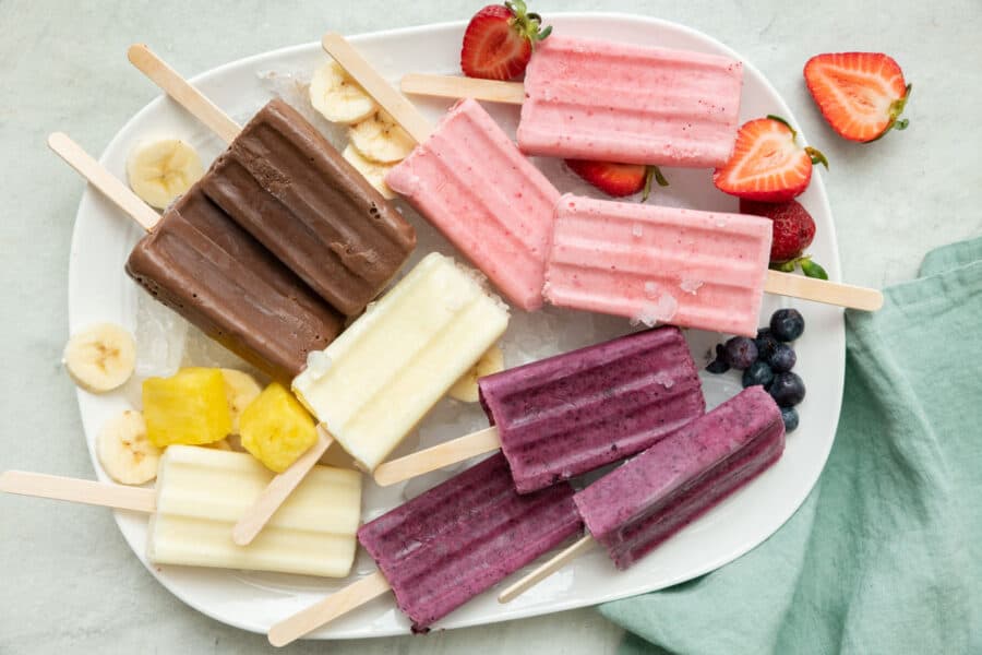 frozen yogurt popsciles on a tray with 4 flavors