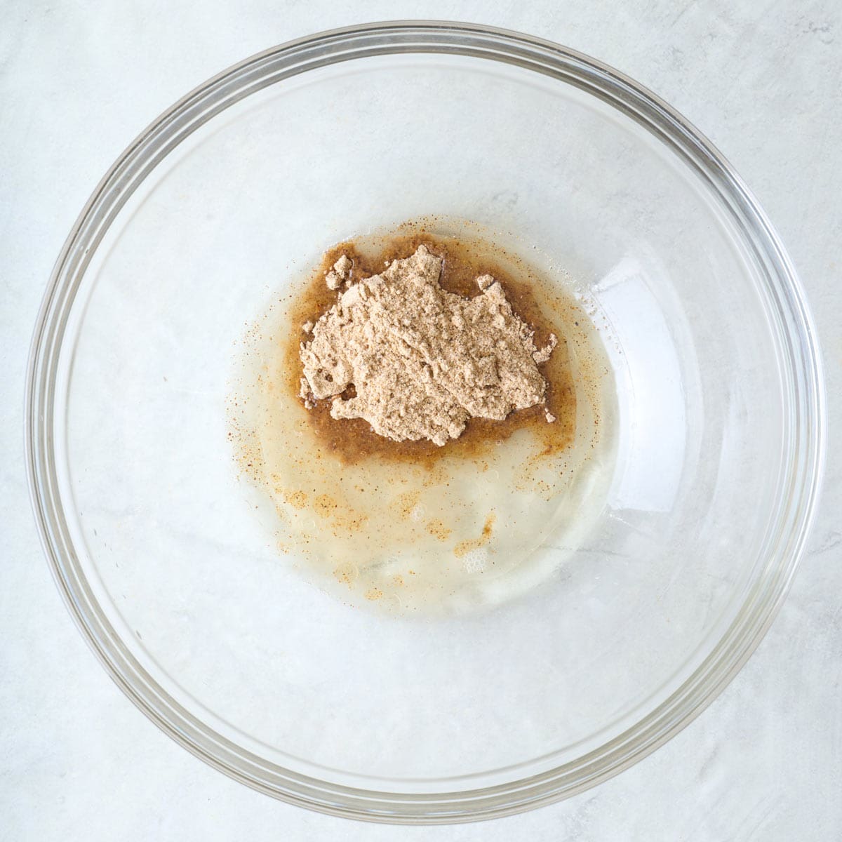 Chicken marinade ingredients in a bowl before mixing.