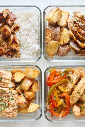 Four chicken meal prep recipes in glass storage containers: chicken teriyaki, chicken fajita, honey mustard chicken, and lemon garlic chicken.